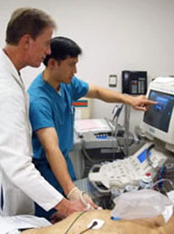 Ultrasound students at station